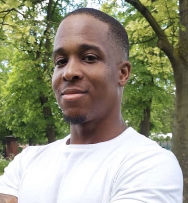 Personal trainer Dean coaching client during outdoor workout